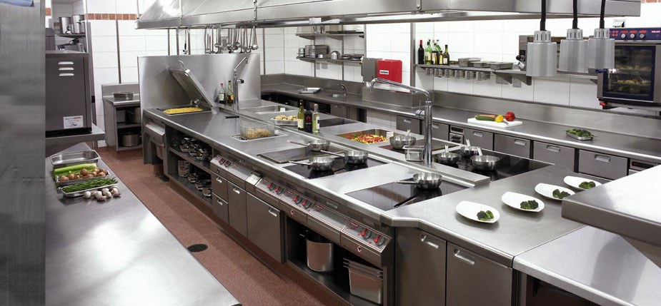 Fast food restaurant kitchen equipped with freezers and refrigerators
