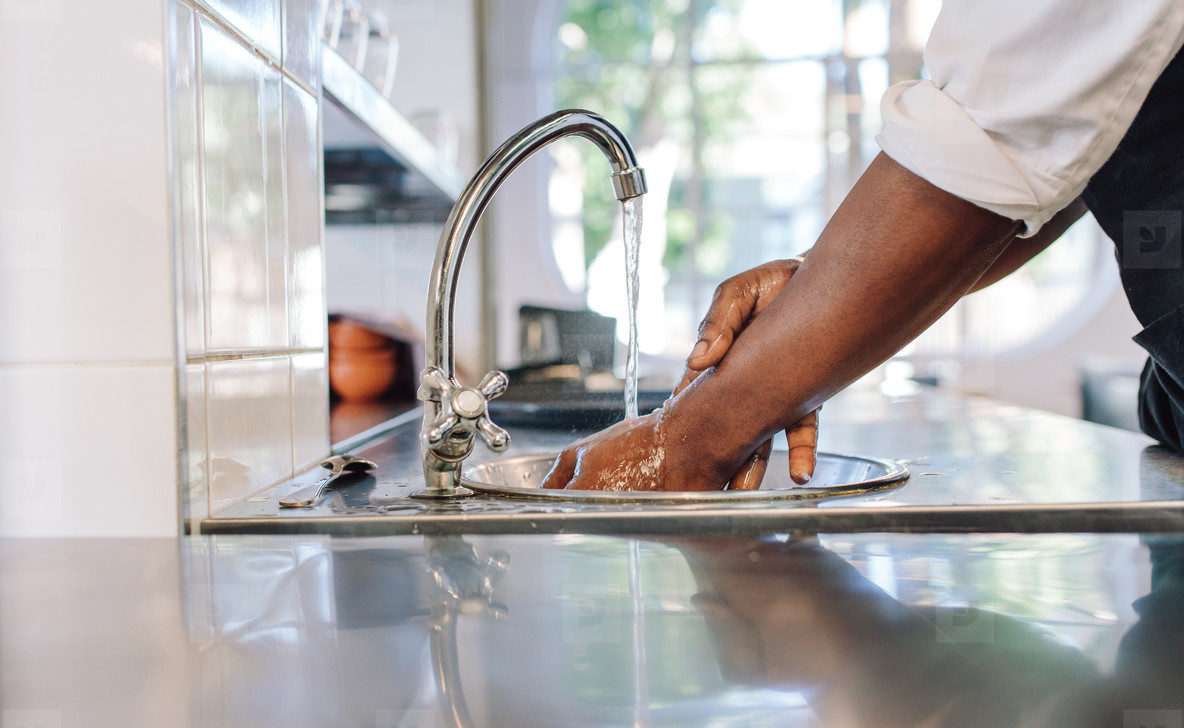 Restaurant Chef washing hands