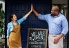 A Step By Step Guide On How To Start A Restaurant Business In India In 2023 A woman and a man high-fiving after successfully starting a restaurant