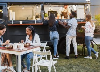A Complete Guide On How To Open A Food Truck Business In India In 2023 Customers at a food truck ordering meals