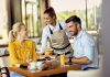 Effective Strategies To Improve Your Restaurant Service And Provide A Stellar Guest Experience – A 2023 guide Restaurant staff serving customers on table