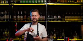 19 Unique Bar Promotion Ideas That Are Sure To Increase Your Bar Sales In 2023 Bartender preparing beverages