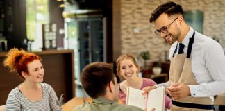 What Brings Customers Back To Your Restaurant: The Customers’ Verdict Restaurant staff taking order from customers on the table