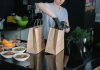 Trends Emerging In The Food Delivery And Online Ordering Post Pandemic Waitress packing Order