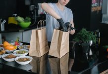 Trends Emerging In The Food Delivery And Online Ordering Post Pandemic Waitress packing Order