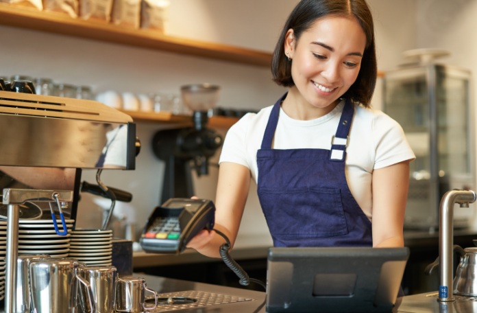 Restaurant Staff taking order on a POS System