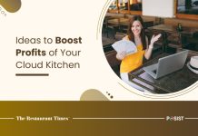 How to Boost Profits of Your Cloud Kitchen In 2024 A woman entrepreneur looking happy over the profits