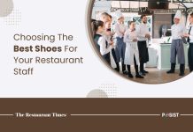 How To Choose The Best Shoes For Your Restaurant Staff A team of restaurant staff standing in a restaurant kitchen