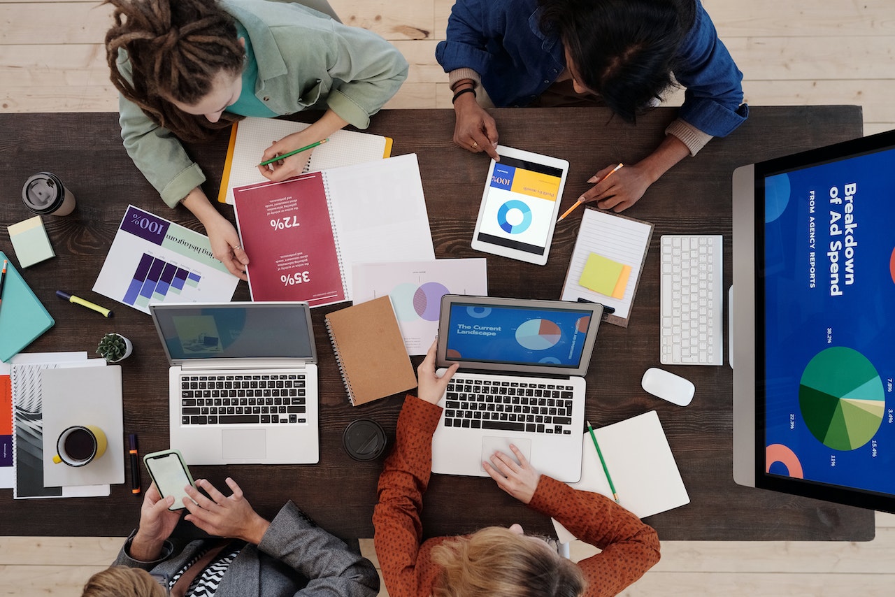 A team of marketing professionals working on a digital plan