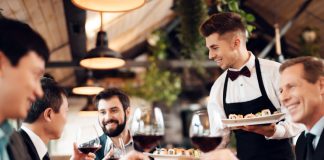 5 Restaurant Staff Incentive Ideas To Inspire And Motivate Your Employees Restaurant Staff serving customers