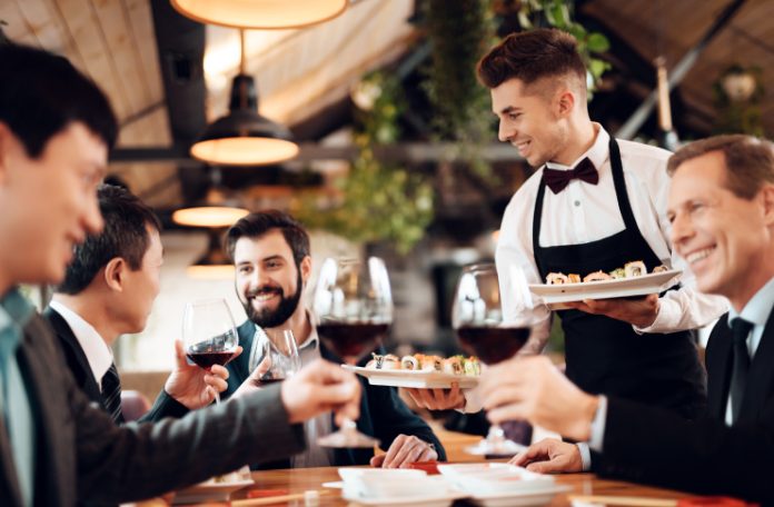 Restaurant Staff serving customers