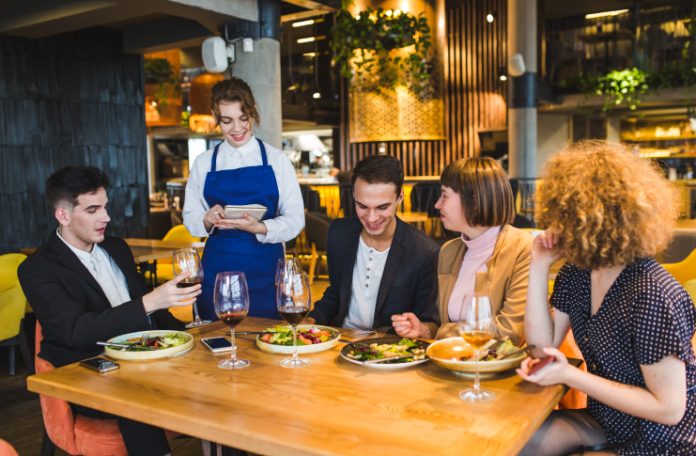 Restaurant Staff taking order from customers