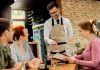 5 Restaurant Customer Service Techniques To Bring Back More Customers Restaurant staff attending the customers with a smile