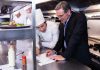7 Pro Tips To Keep Restaurant Food Costs Under Control Restaurant manager and chef calculating the food costs