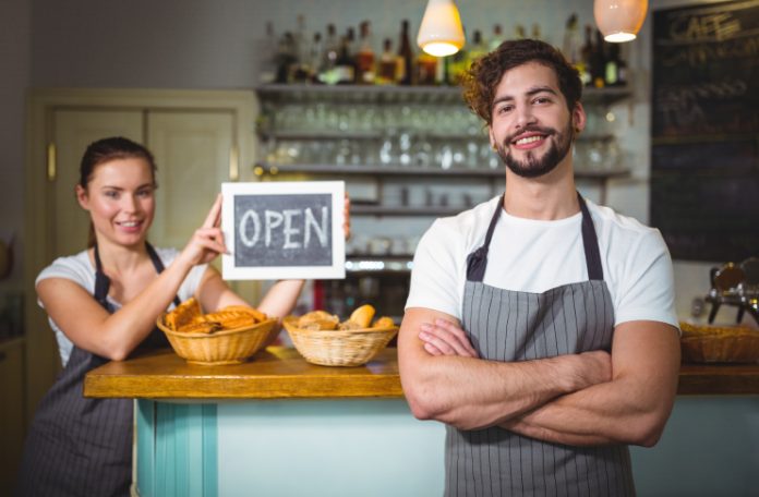 Restaurant staff opening a restaurant