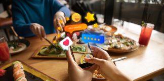 Quick Service Restaurant Marketing Strategies to Bring in More Footfall to Your QSR Customer of a Quick Service Restaurant sharing the food pictures on social media platform