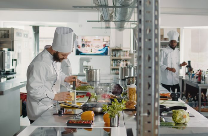 Chef preparing orders in a cloud kitchen restaurant