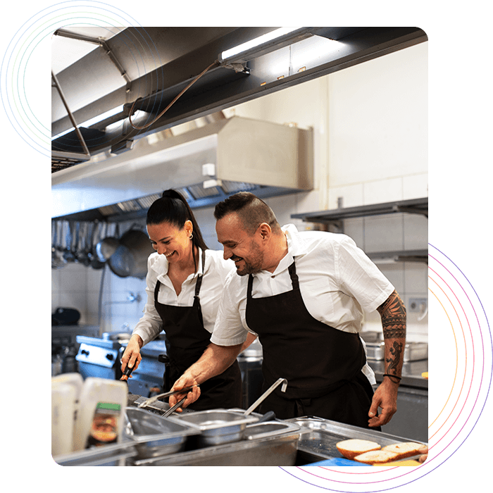 Anti-theft software Two chefs preparing food in a restaurant kitchen